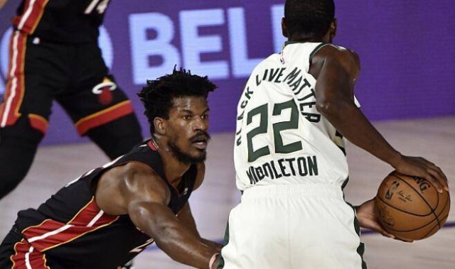  巴特勒硬解关键球热火加时险胜活塞续强势